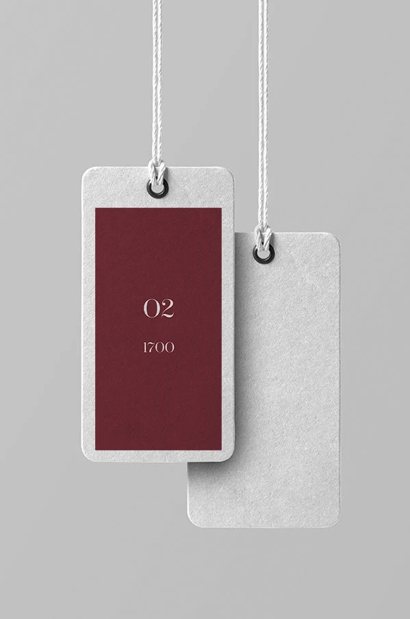 Hang tag in maroon reading 02, 1700